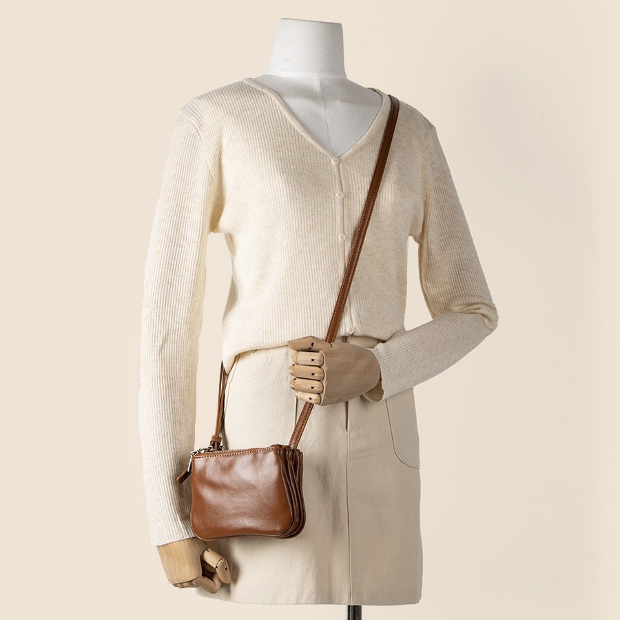 PU solid color single shoulder new small square with multiple pockets, high-end sense, niche and versatile crossbody bag for women in summer