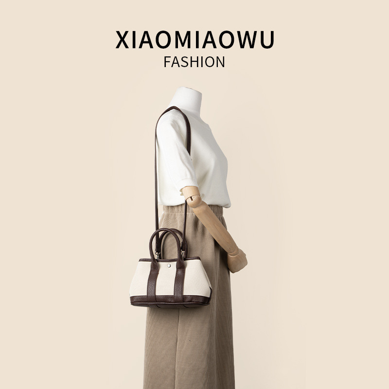 Minimally artistic versatile crossbody canvas shoulder bag, niche summer light luxury high-end women's hand-held vegetable basket bag