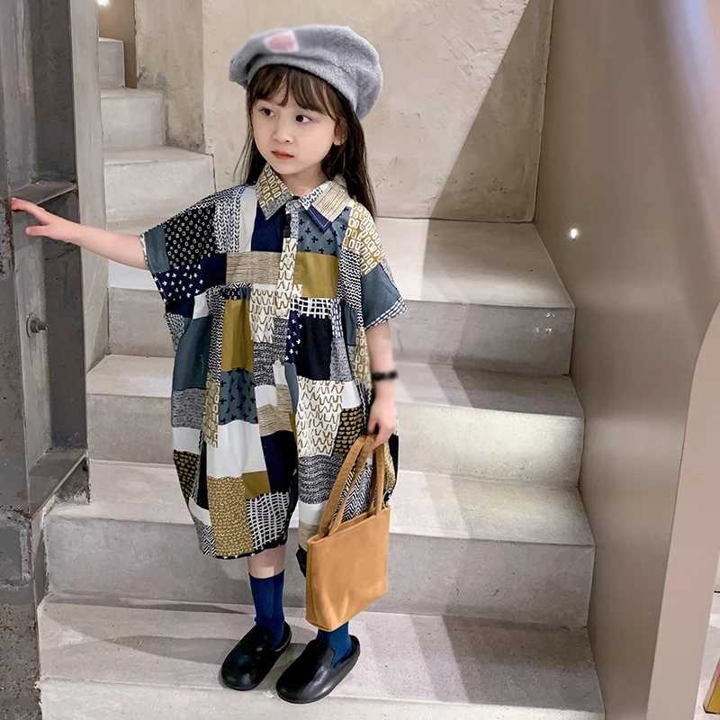 Childrens vacation beach overalls girls Korean summer jumpsuit fashionable and sweet lapel patchwork loose jumpsuit W240806