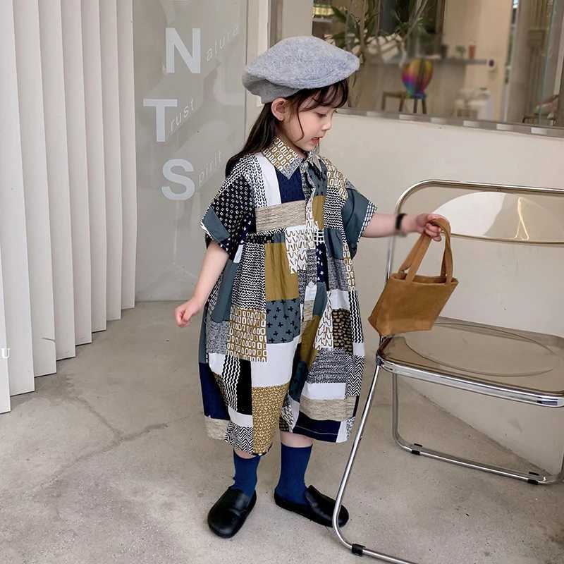 Childrens vacation beach overalls girls Korean summer jumpsuit fashionable and sweet lapel patchwork loose jumpsuit W240806