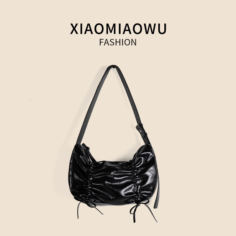 Korean version of new drawstring pleated armpit with high-end feel, bow single shoulder bag, summer style women's versatile dumpling bag