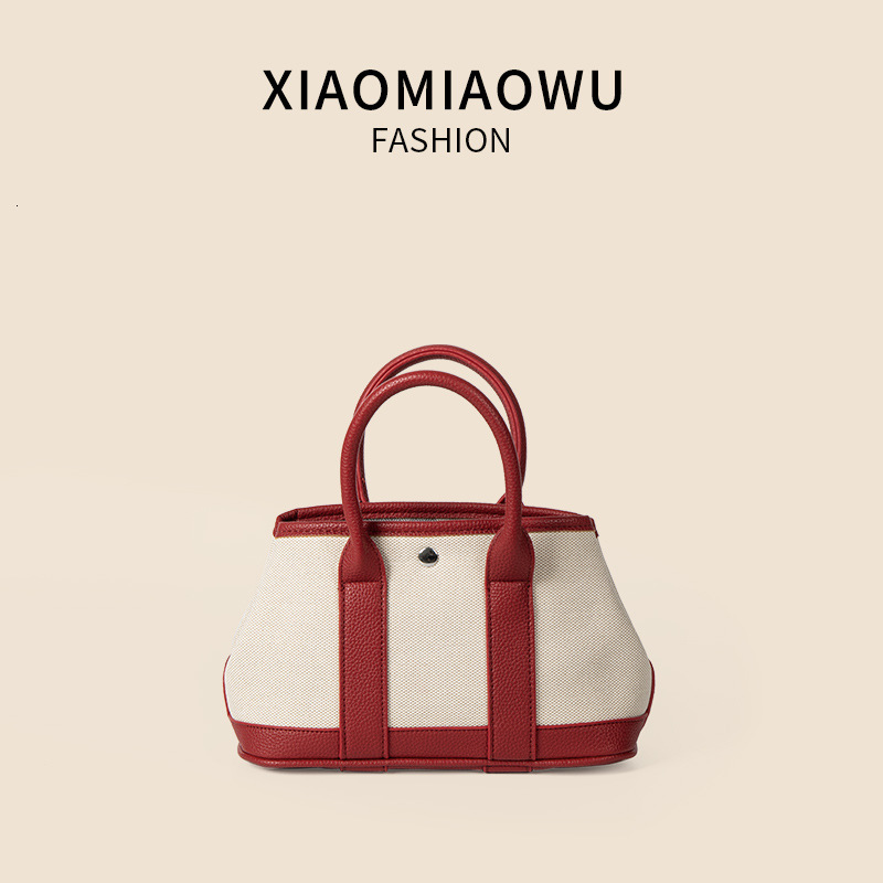 Minimally artistic versatile crossbody canvas shoulder bag, niche summer light luxury high-end women's hand-held vegetable basket bag