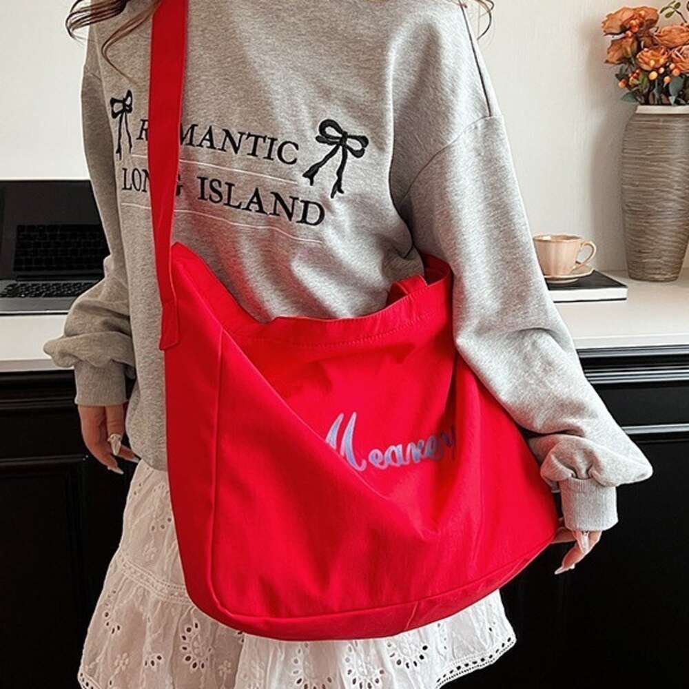 ISN leisure large capacity diagonal canvas crossbody lazy style class commuting soft bag lightweight and versatile shopping