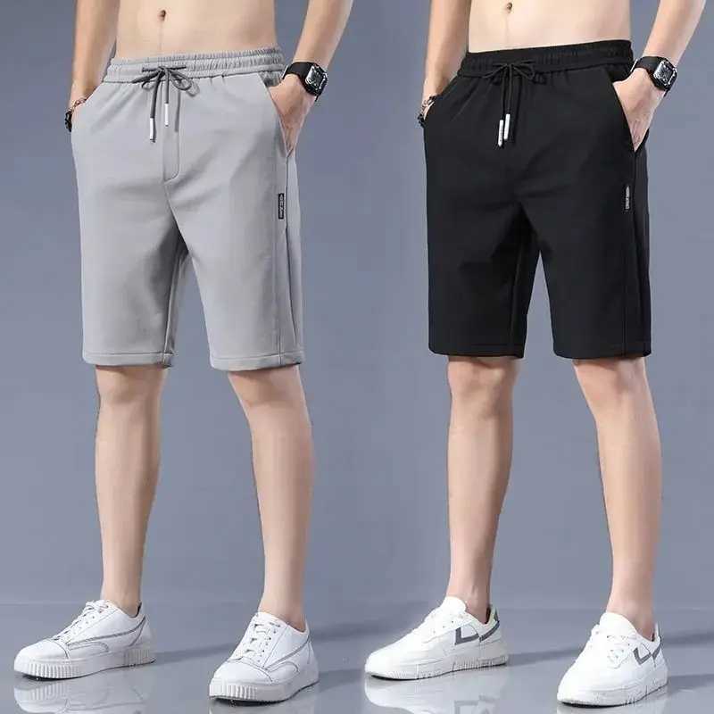 High Quality Polyester Ice Silk Shorts Men 2024 New Korean Version Of Loose Elastic Splicing Beach Five Minute Medium PantsXJ240817