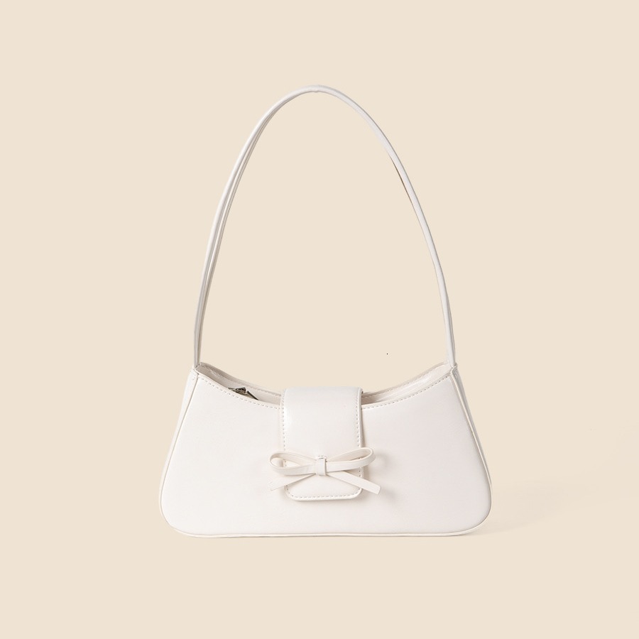 Spring and summer new women's high-end fashion commuting handbag bow spicy girl niche silver armpit bag