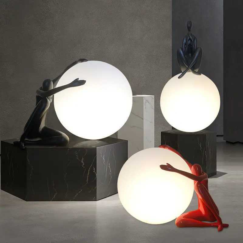 Nordic art floor lamp abstract decoration of human figure holding ball vertical lamp creative figure sculpture decorative table Y240820