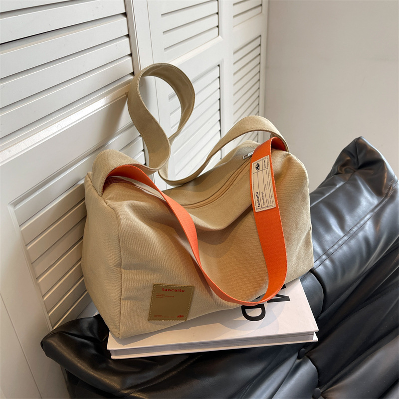 Simple and stylish crossbody tote online red envelope women's 2024 new casual canvas bag, large capacity shoulder bag