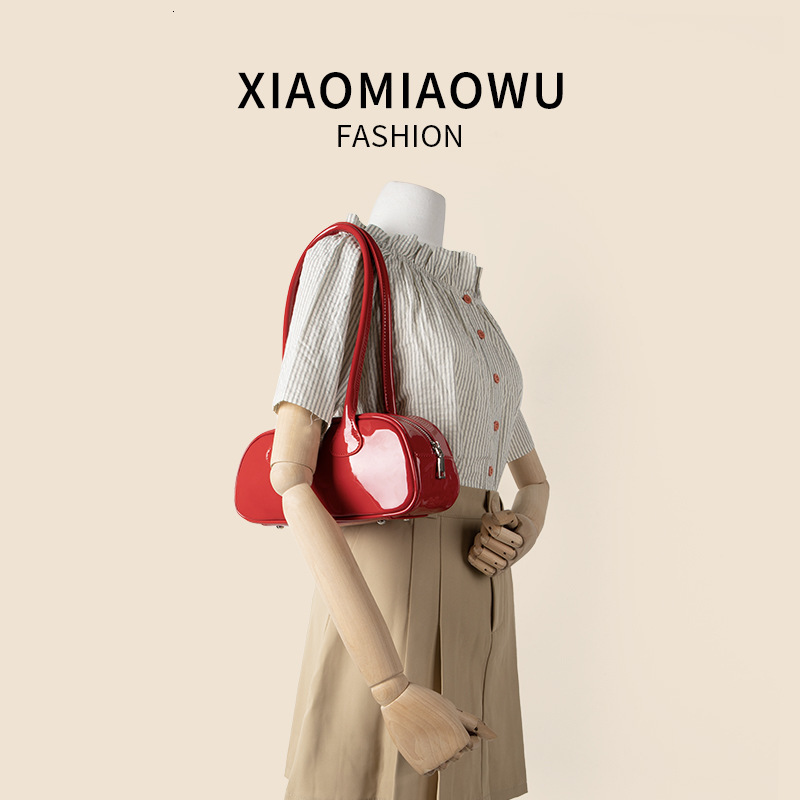 Korean version simple and fashionable solid color shoulder women's high-end feeling, western-style armpit bag, summer new item, niche PU stick ba