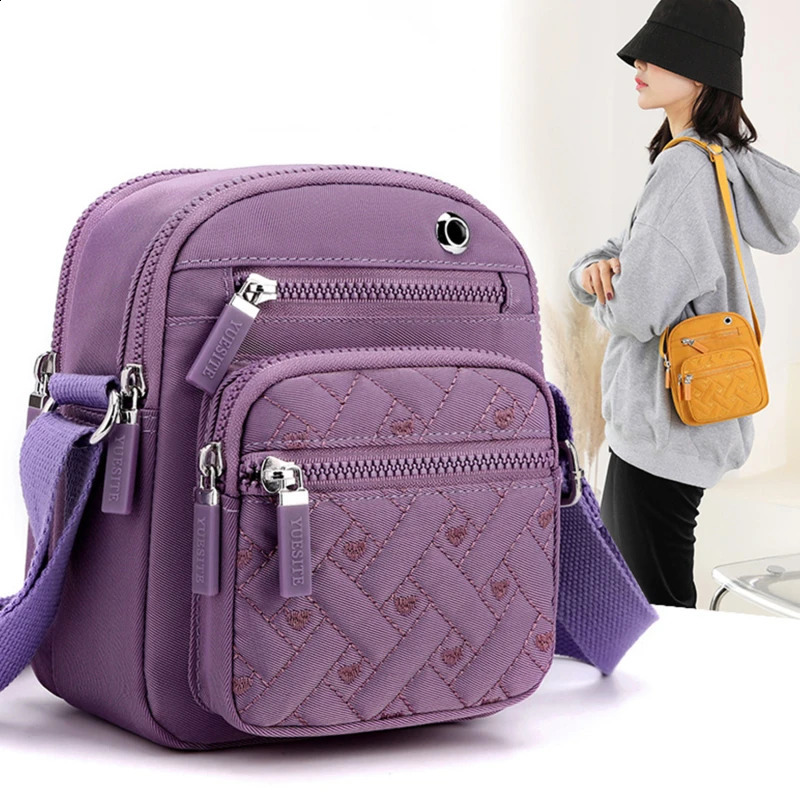 Womens waterproof shoulder bag with ten letter zipper mobile phone womens multifunctional handbag wrist bag wallet womens bag 240819