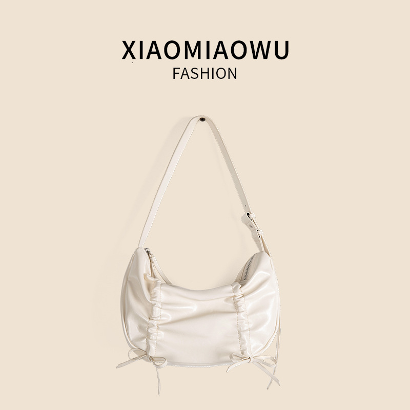 Korean version of new drawstring pleated armpit with high-end feel, bow single shoulder bag, summer style women's versatile dumpling bag