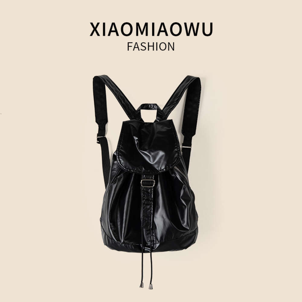 Korean version shiny silver drawstring high-end feel, light travel large capacity backpack, university women's minimalist