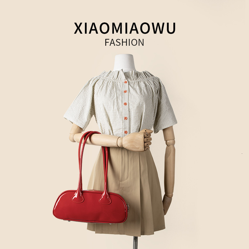Korean version simple and fashionable solid color shoulder women's high-end feeling, western-style armpit bag, summer new item, niche PU stick ba