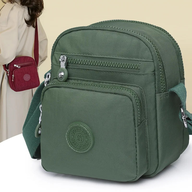 Womens Mini Shoulder Bag 2024 Waterproof Nylon Stand up Mobile Wallet Multi layer Messenger Bag Womens Mini Cross Bag 240819