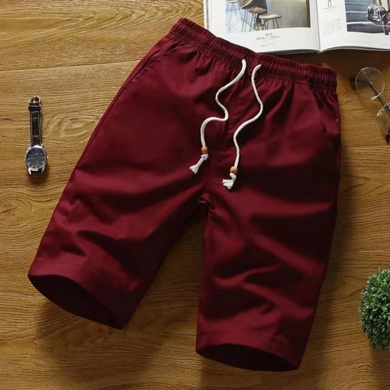 Summer pure cotton mens casual solid color shorts straight tube loose breathable elastic waist with bead tie rope 240819