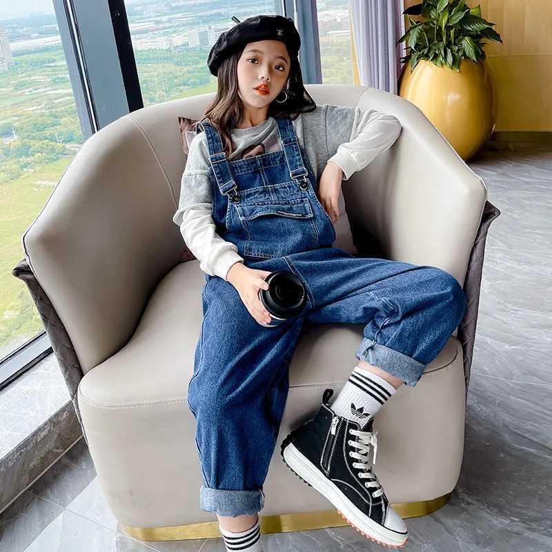 Preschool girl jumpsuit fashionable solid color jeans suitable for children teenagers cotton suspension loose childrens denim jumpsuit W240806