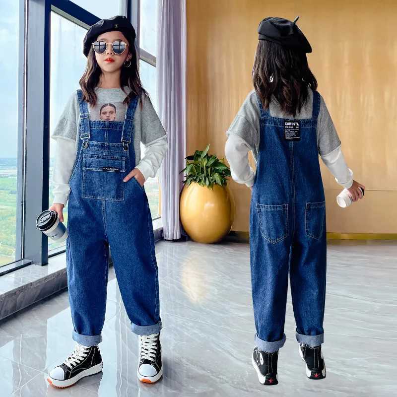 Preschool girl jumpsuit fashionable solid color jeans suitable for children teenagers cotton suspension loose childrens denim jumpsuit W240806