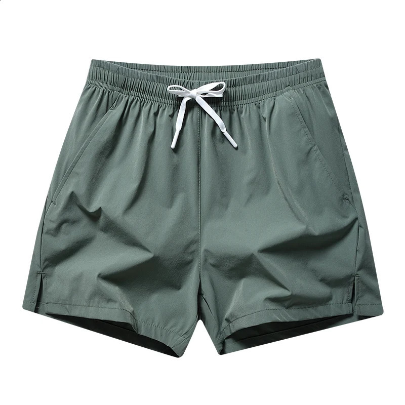 Minimalist Fashion Pocket Elastic Mens Summer Sports Ice Silk Thin Casual Edition Drawstring Loose Beach Shorts 240819
