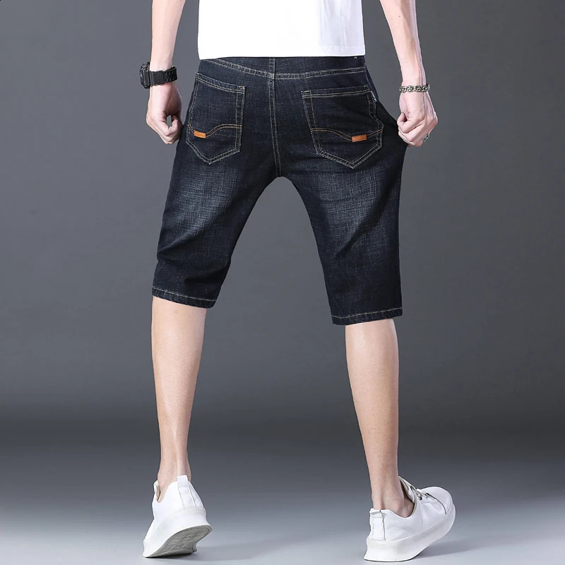 minimalist and fashionable summer mens solid color pocket zipper casual loose straight leg denim shorts 240819