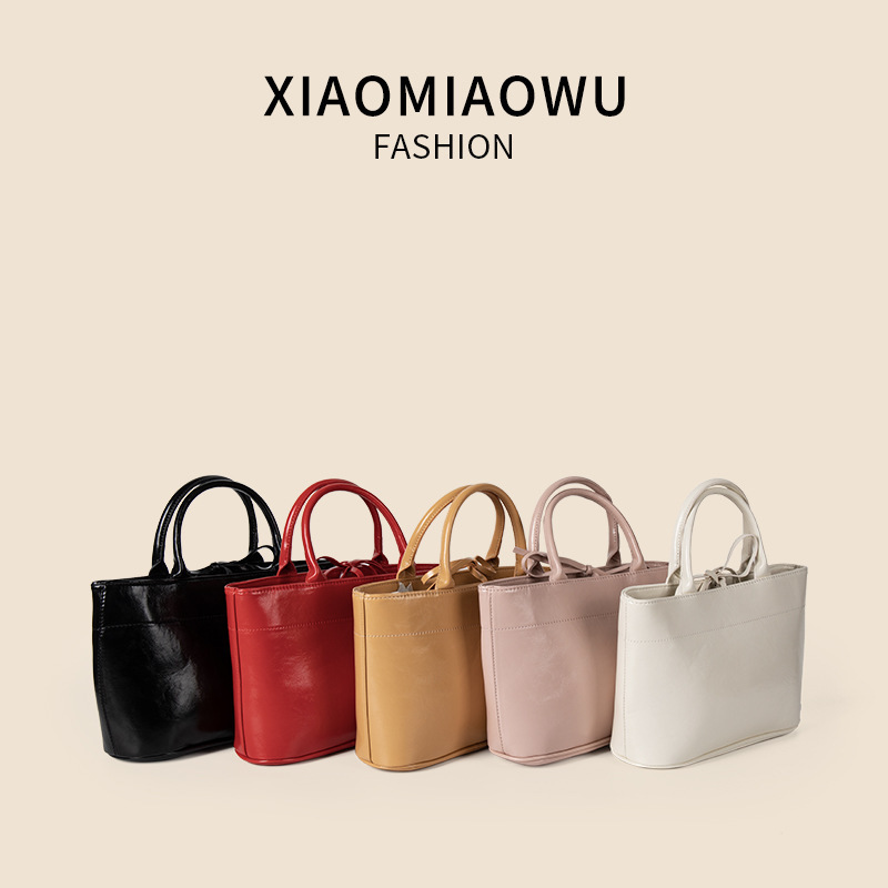 Summer Korean version vegetable basket handbag, simple solid color, open mouth bucket bag, high-end, exquisite, niche commuting bag