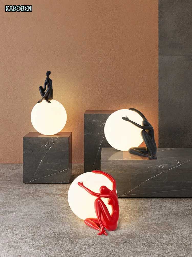 Nordic art floor lamp abstract decoration of human figure holding ball vertical lamp creative figure sculpture decorative table Y240820