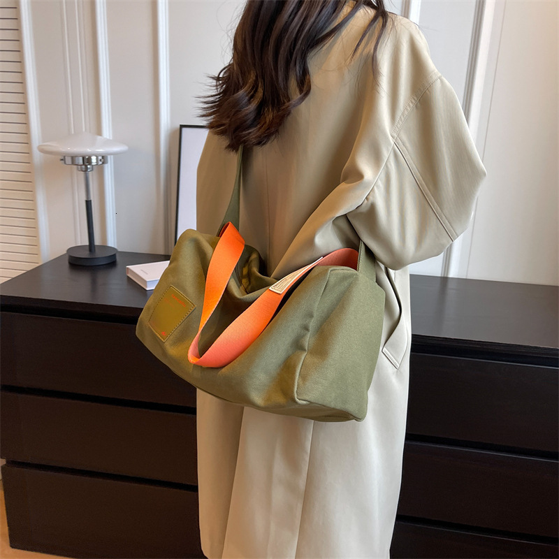 Simple and stylish crossbody tote online red envelope women's 2024 new casual canvas bag, large capacity shoulder bag