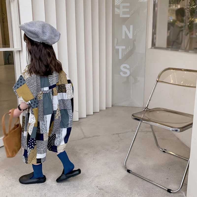 Childrens vacation beach overalls girls Korean summer jumpsuit fashionable and sweet lapel patchwork loose jumpsuit W240806