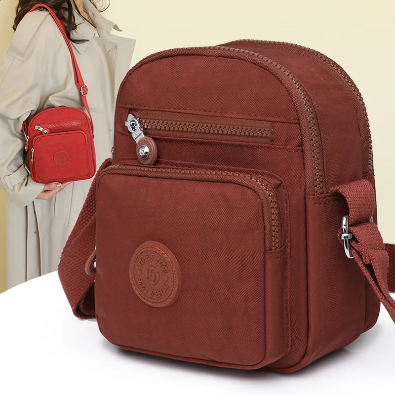 Womens Mini Shoulder Bag 2024 Waterproof Nylon Stand up Mobile Wallet Multi layer Messenger Bag Womens Mini Cross Bag 240819