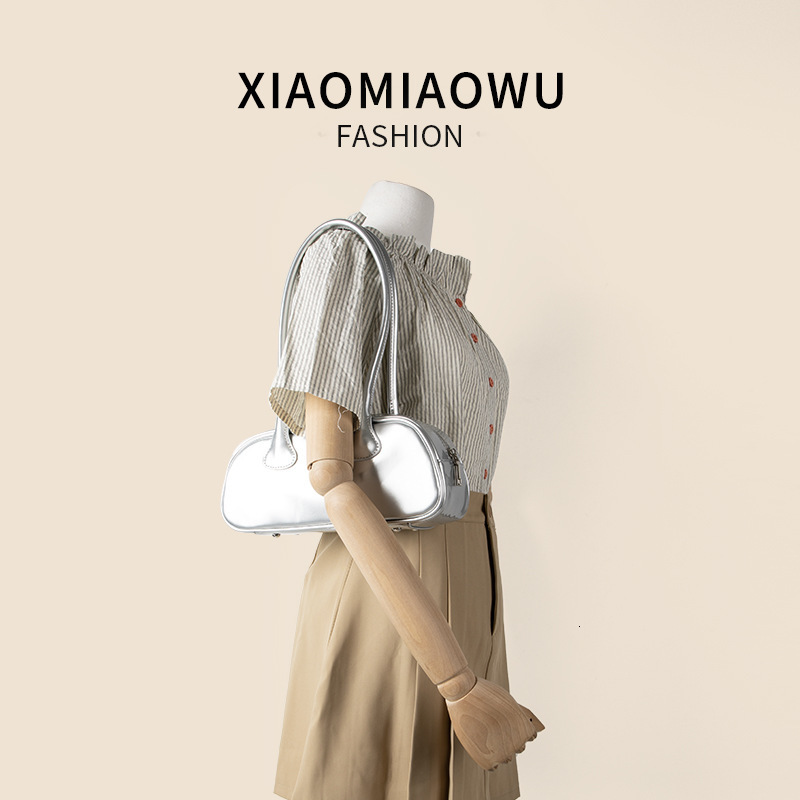 Korean version simple and fashionable solid color shoulder women's high-end feeling, western-style armpit bag, summer new item, niche PU stick ba