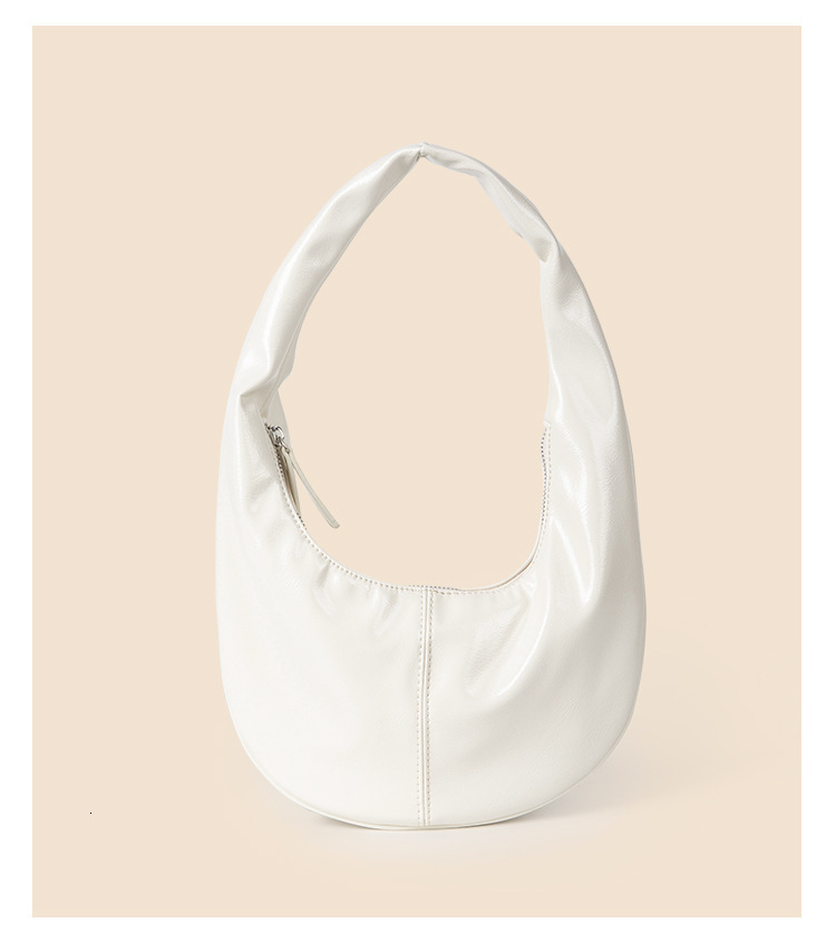 Personalized and fashionable cream colored patent shiny bread PU leather versatile Korean version hand-held armpit dumpling bag women's summer