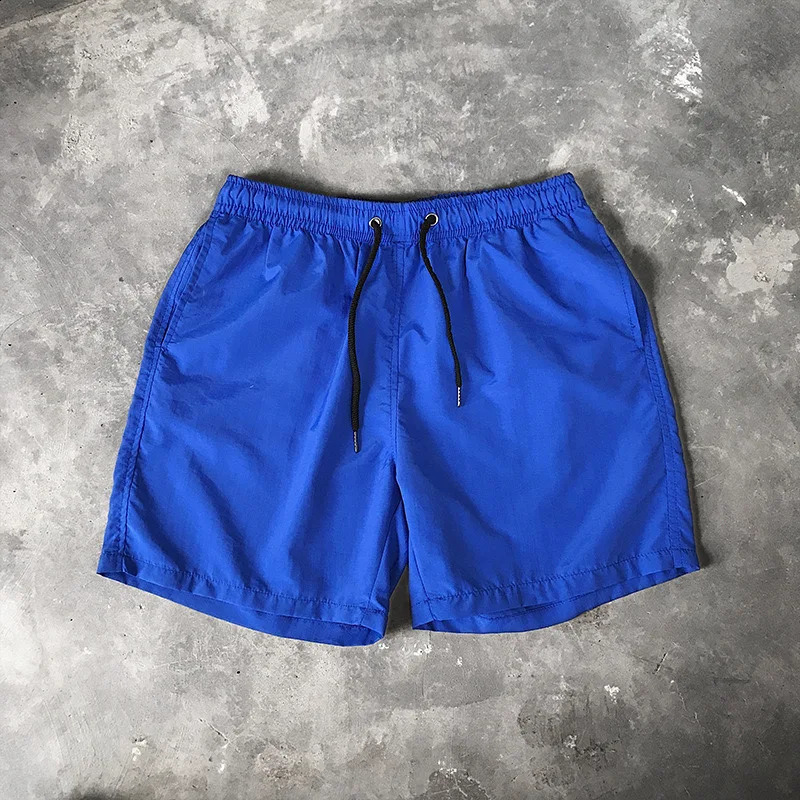 Ice silk mens beach shorts lightweight and breathable summer sports candy colored surfing loose oversized 240819