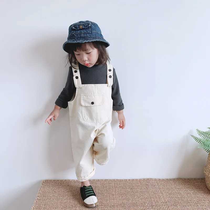 Autumn childrens pocket denim covering boys solid simple suspension jumpsuit girls baby loose casual pants baby cotton Trouser W240806