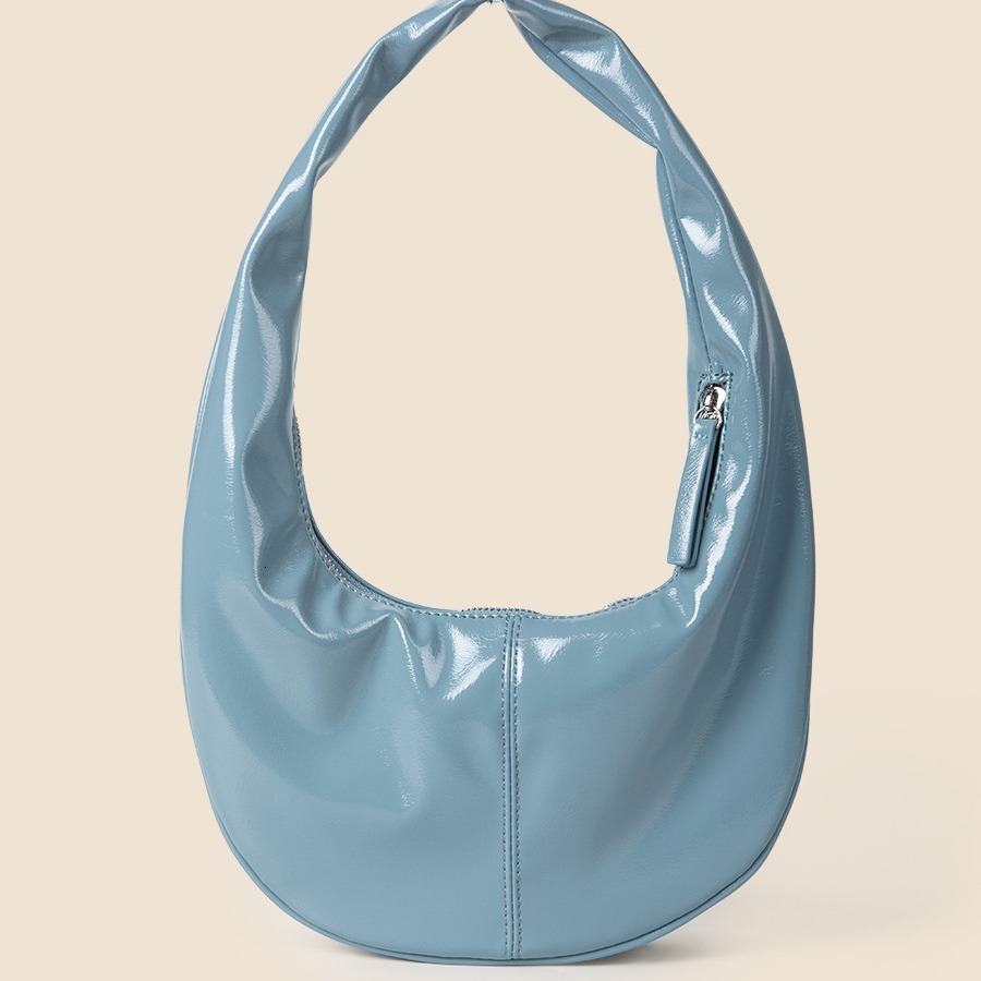 Personalized and fashionable cream colored patent shiny bread PU leather versatile Korean version hand-held armpit dumpling bag women's summer