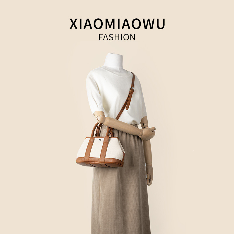 Minimally artistic versatile crossbody canvas shoulder bag, niche summer light luxury high-end women's hand-held vegetable basket bag