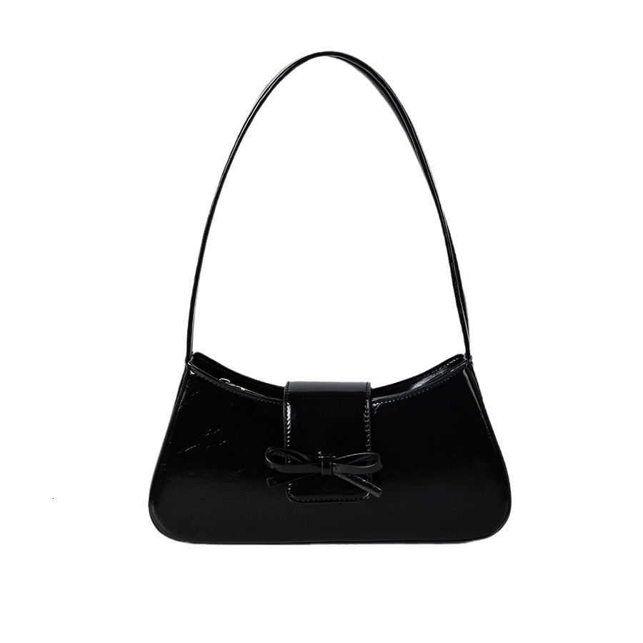 Spring and summer new women's high-end fashion commuting handbag bow spicy girl niche silver armpit bag