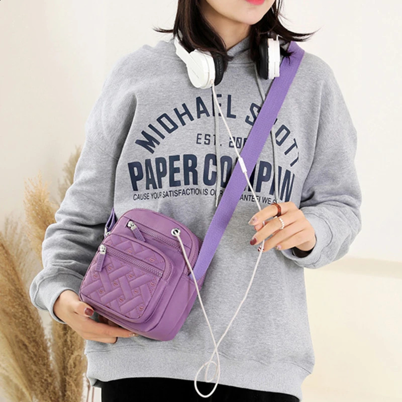 Womens waterproof shoulder bag with ten letter zipper mobile phone womens multifunctional handbag wrist bag wallet womens bag 240819