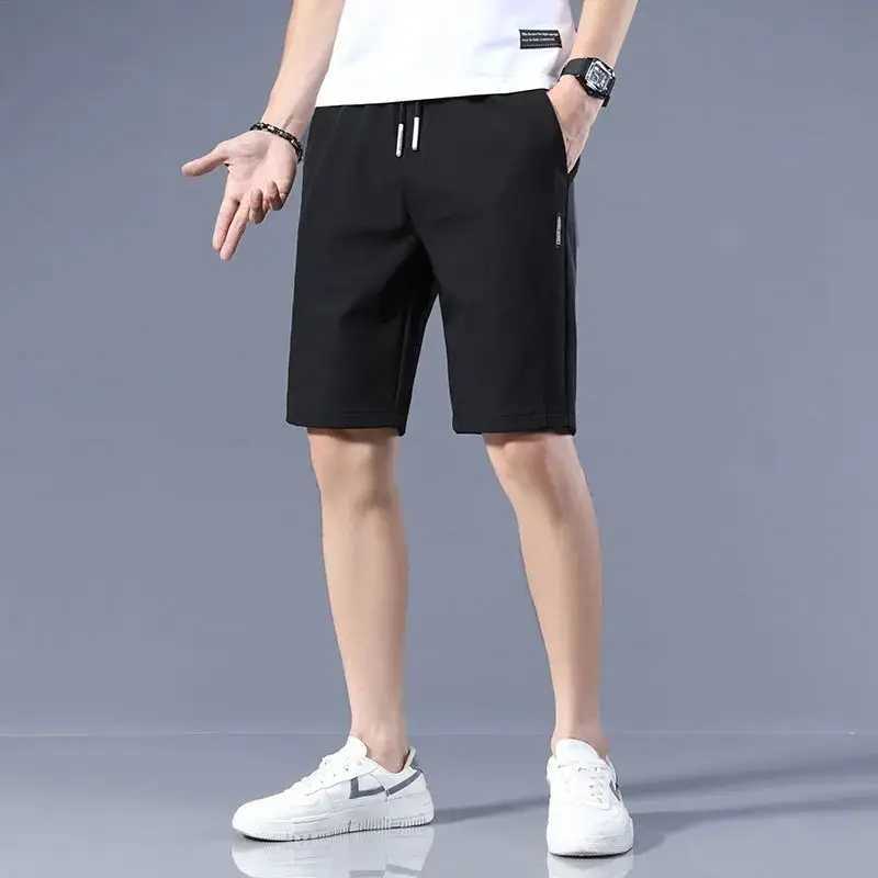 High Quality Polyester Ice Silk Shorts Men 2024 New Korean Version Of Loose Elastic Splicing Beach Five Minute Medium PantsXJ240817