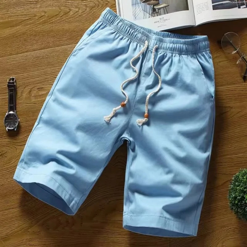 Summer pure cotton mens casual solid color shorts straight tube loose breathable elastic waist with bead tie rope 240819