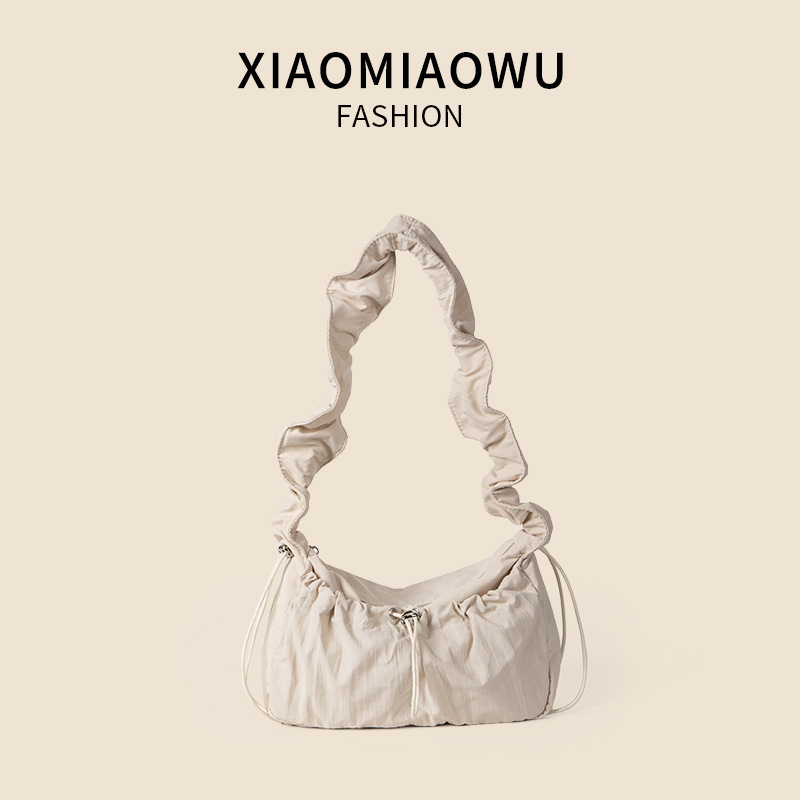 Pulling rope nylon pleated bag for women in summer, lightweight solid color women's crossbody bag, fashionable high-end, versatile and single sho