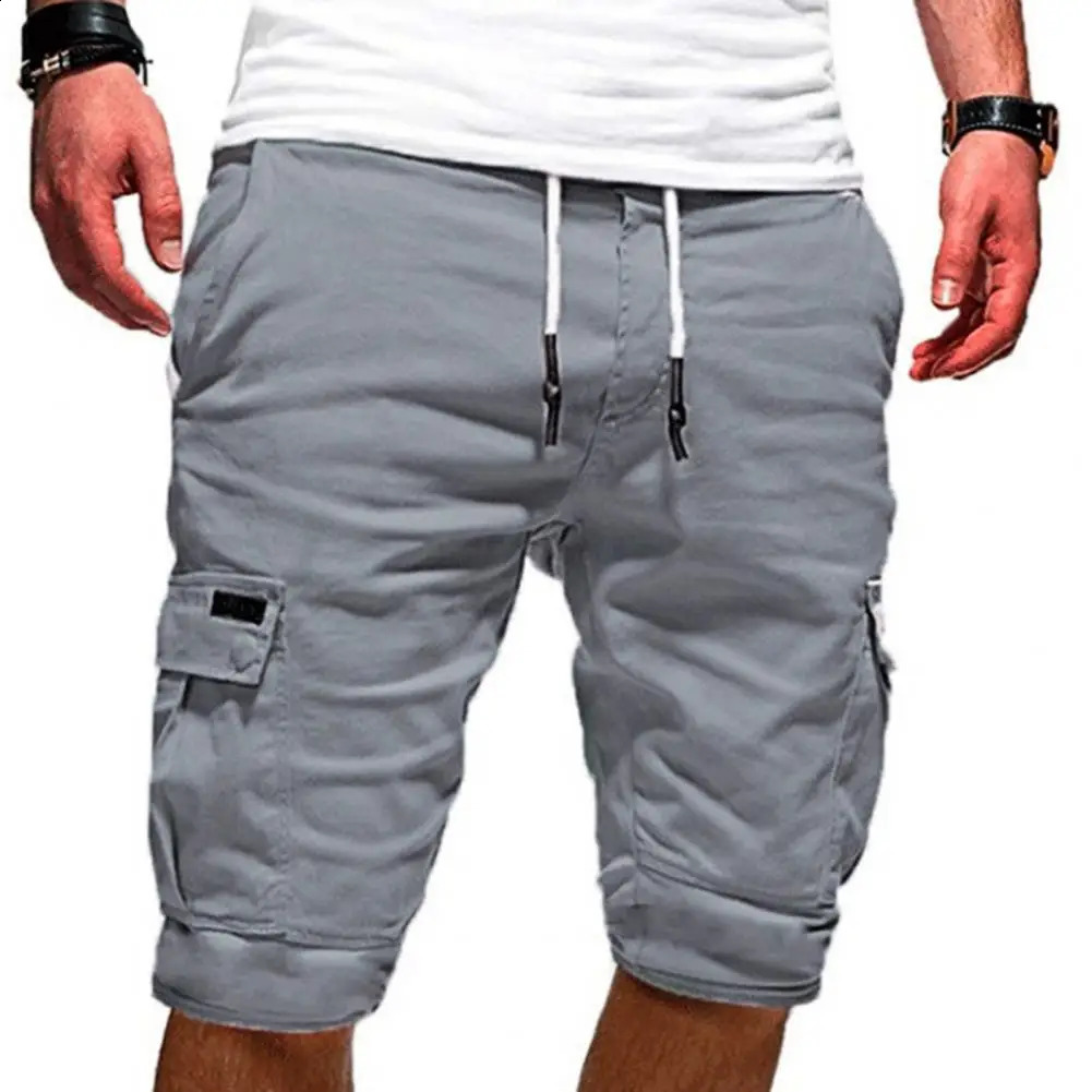 Fashion half pants cargo shorts solid color multi pocket summer mens loose pull rod jogging clothing 240819