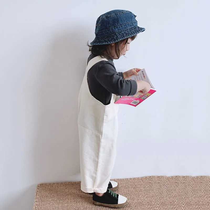 Autumn childrens pocket denim covering boys solid simple suspension jumpsuit girls baby loose casual pants baby cotton Trouser W240806