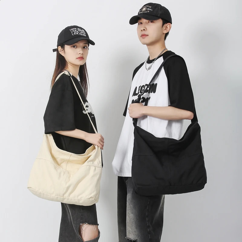 Simple solid color college shoulder bag womens student canvas cross body bag mens cool backpack womens travel messenger bag 240819