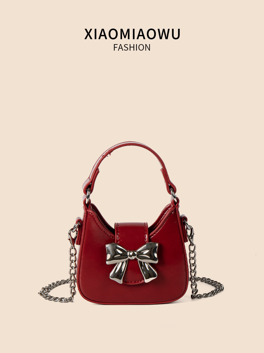 Bow fashion motorcycle sweet and spicy style, versatile summer crossbody, black chain bag, women's high-end sense, niche