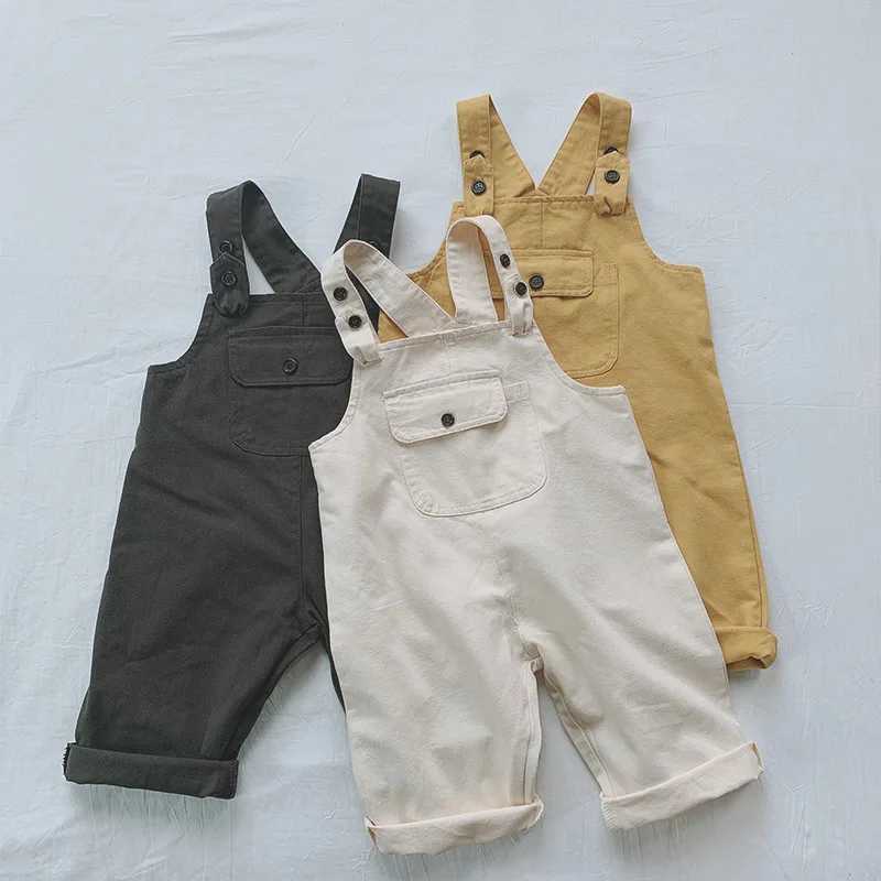 Childrens coated autumn new baby sleeveless jumpsuit for boys and girls solid casual pants with childrens cotton loose pants W240806