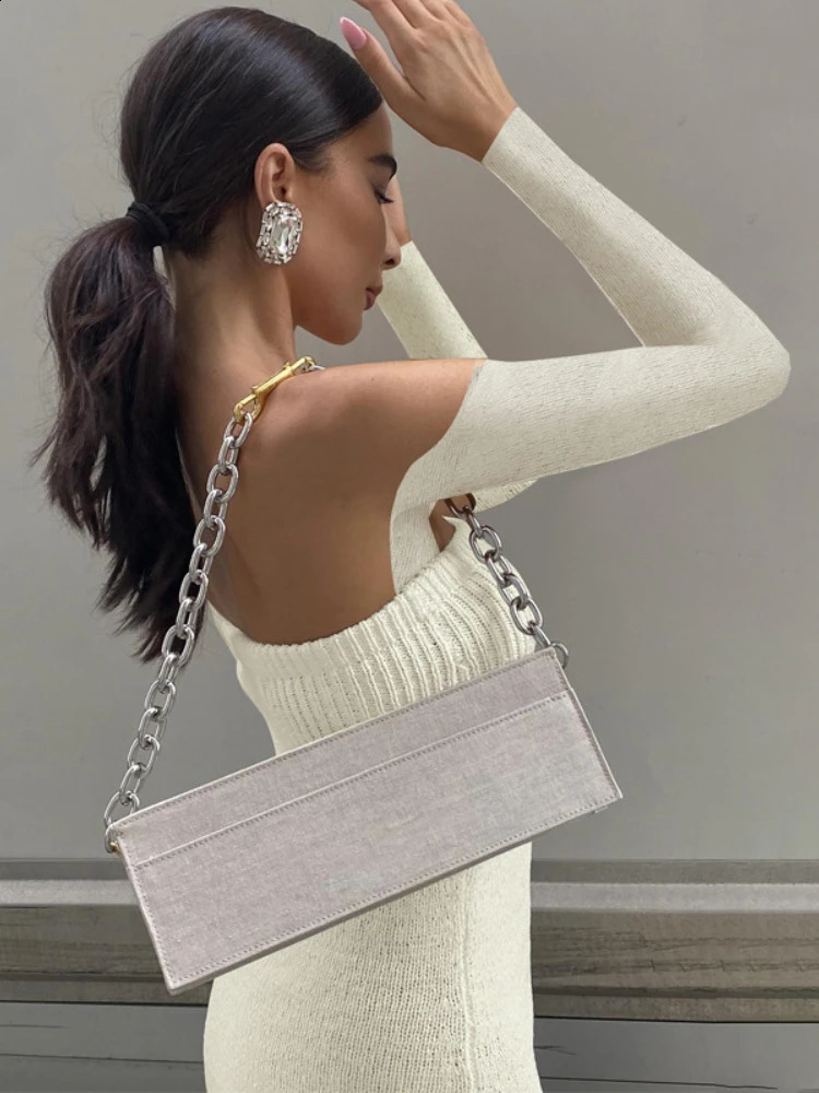 Summer Fashion Elegant Beach Vacation Woolen Long Dress Sexy Wrapped Chest Long Sleeve Hollow Tassel Dress 240819