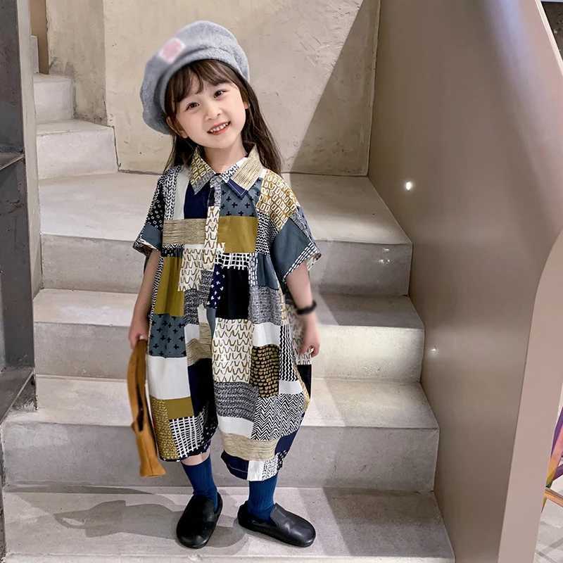 Childrens vacation beach overalls girls Korean summer jumpsuit fashionable and sweet lapel patchwork loose jumpsuit W240806
