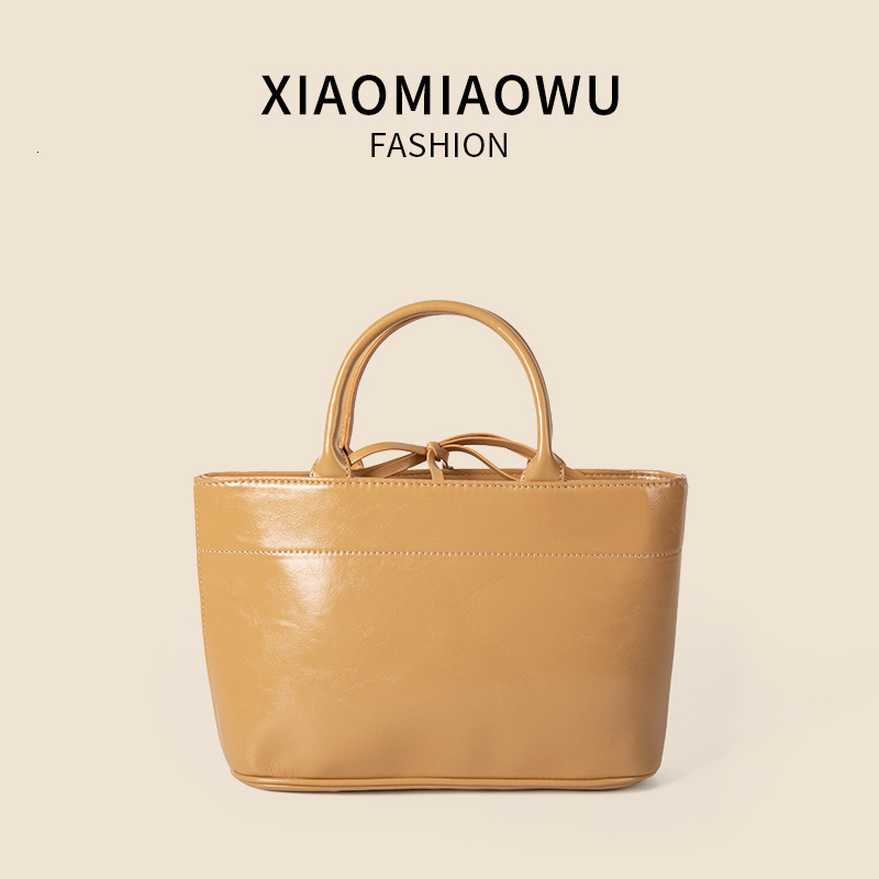 Summer Korean version vegetable basket handbag, simple solid color, open mouth bucket bag, high-end, exquisite, niche commuting bag