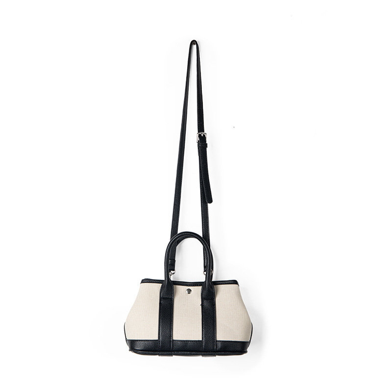 Minimally artistic versatile crossbody canvas shoulder bag, niche summer light luxury high-end women's hand-held vegetable basket bag