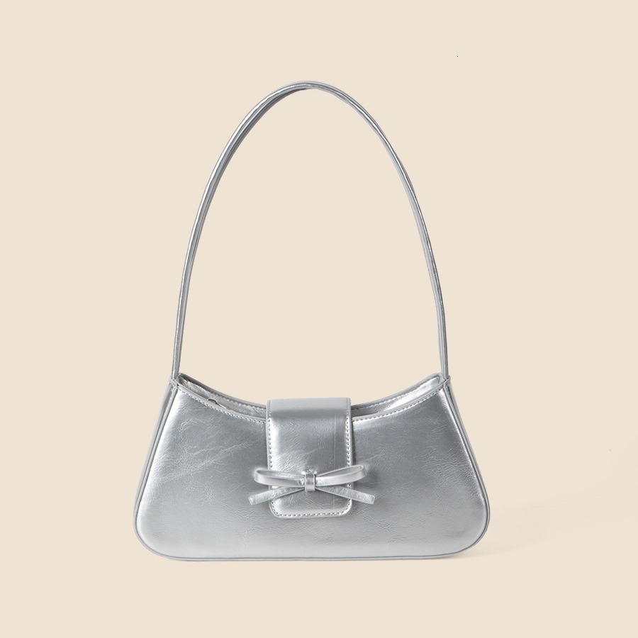 Spring and summer new women's high-end fashion commuting handbag bow spicy girl niche silver armpit bag