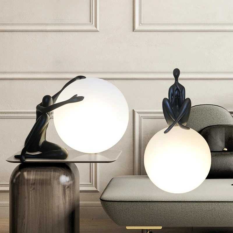 Nordic art floor lamp abstract decoration of human figure holding ball vertical lamp creative figure sculpture decorative table Y240820