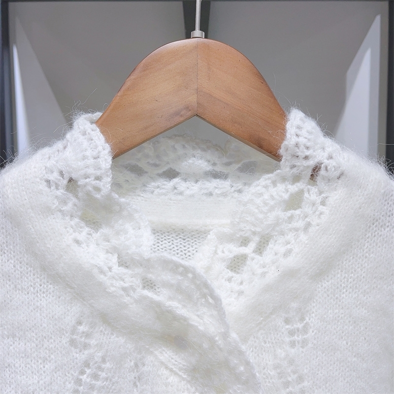 Early spring womens knitted sweater single chest petal decoration hollow cardigan wool soft top 240819